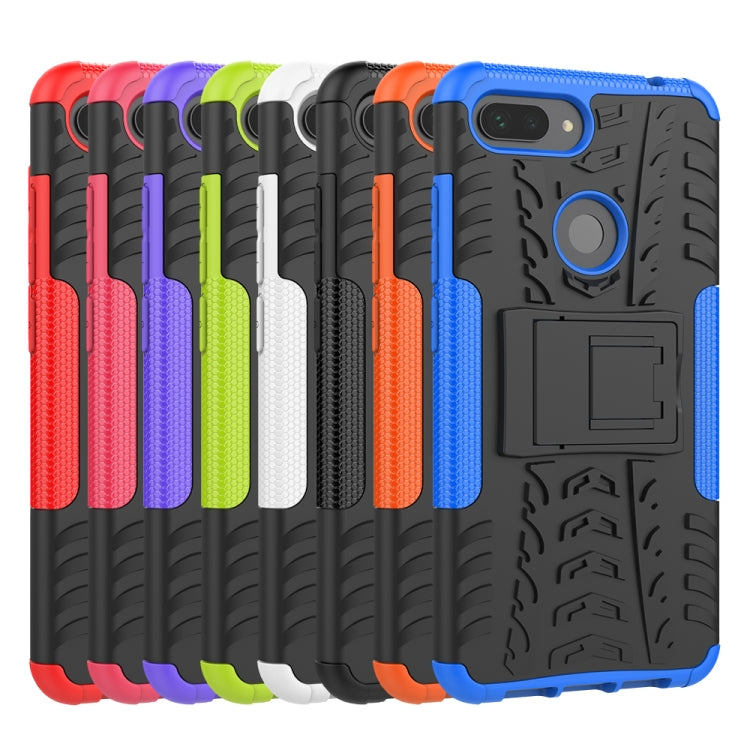 Set of rugged tire tread phone cases in multiple colors with camera cutouts and holder