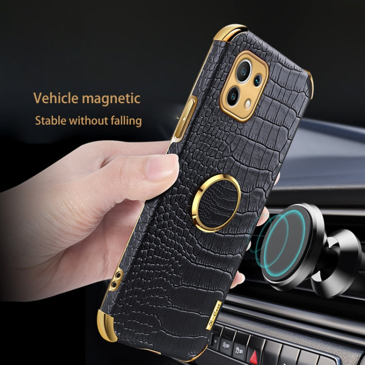 Black crocodile-pattern magnetic phone case with gold ring holder on car mount