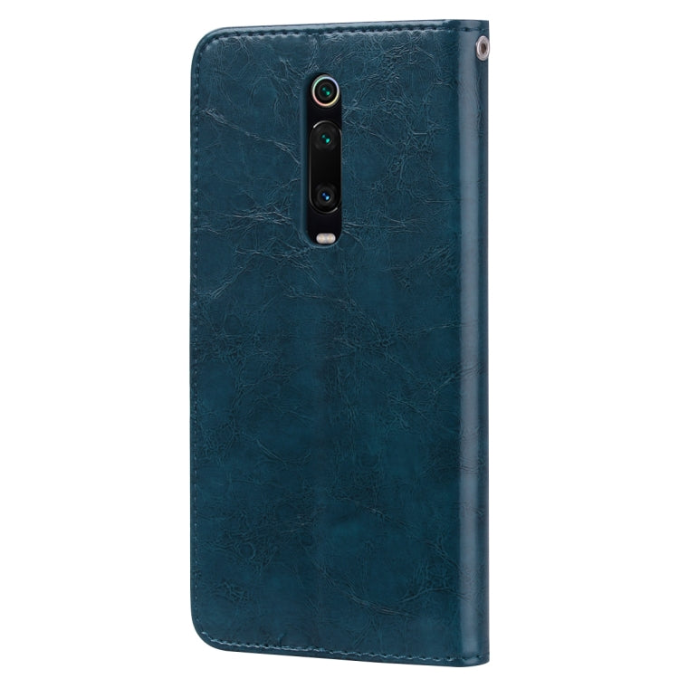 Blue leather flip phone case with camera cutout and front card slot cover