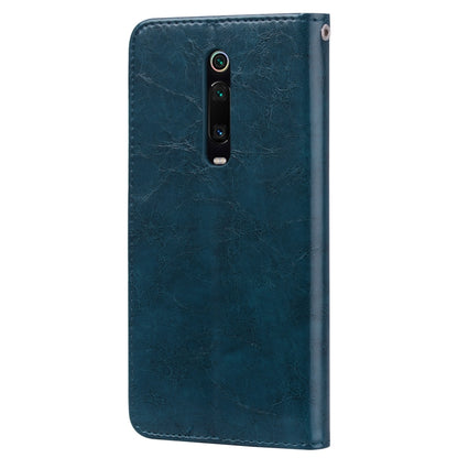 Blue leather flip phone case with camera cutout and front card slot cover