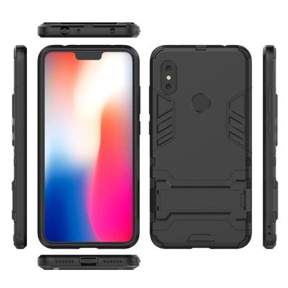 Rugged shockproof phone case, black, showing port cutouts and raised edges