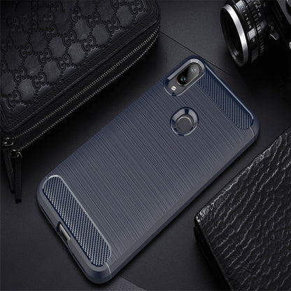 Navy blue carbon-fiber textured TPU phone case with ring grip and camera cutout