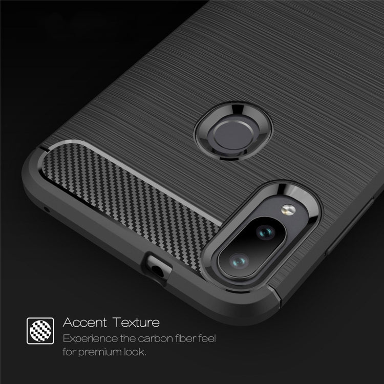 Navy blue carbon-fiber TPU phone case corner detail with camera and ring cutouts