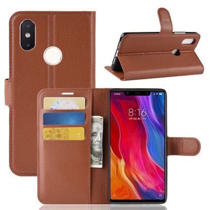 Brown flip leather phone case with wallet pocket and card slots, holder window opening