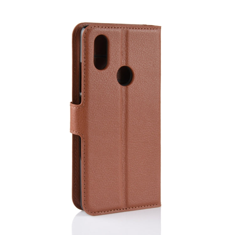 Brown textured leather phone case with cutouts for camera and speaker