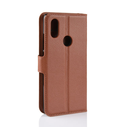 Brown textured leather phone case with cutouts for camera and speaker