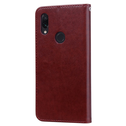 Rose PU leather phone case for Xiaomi Redmi 7, burgundy with camera cutouts.