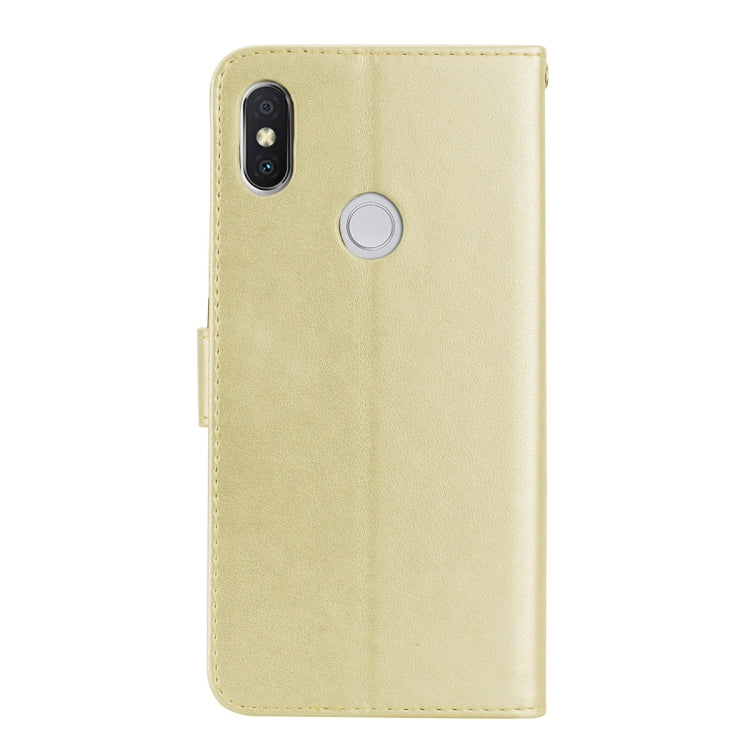 Gold PU leather phone case with rose embossing, camera cutout, and button port