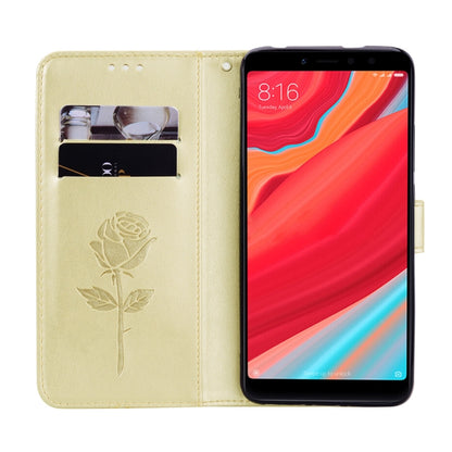 Gold PU leather wallet case with rose embossing, card slot window, and phone cover