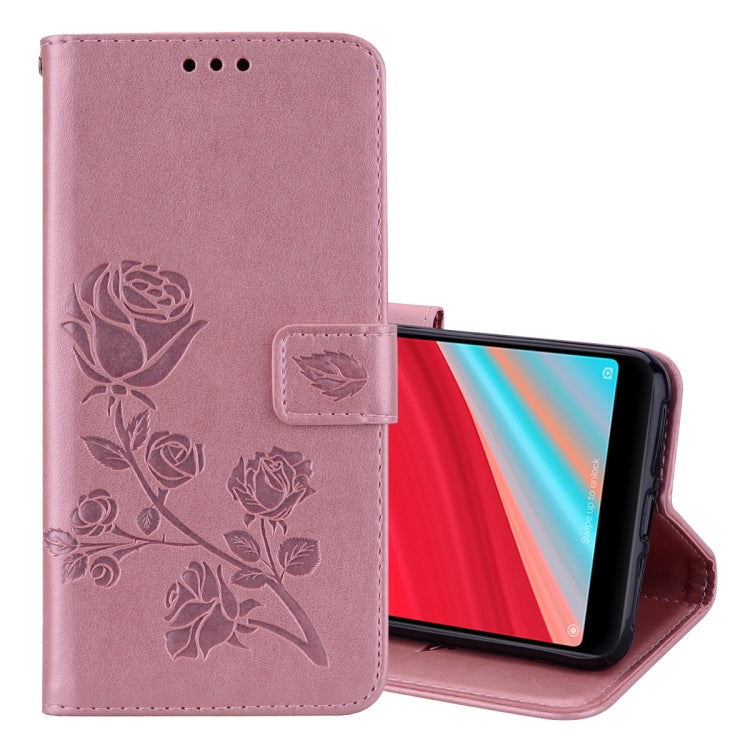 Pink PU leather flip phone case with rose embossing, holder and card-slot wallet