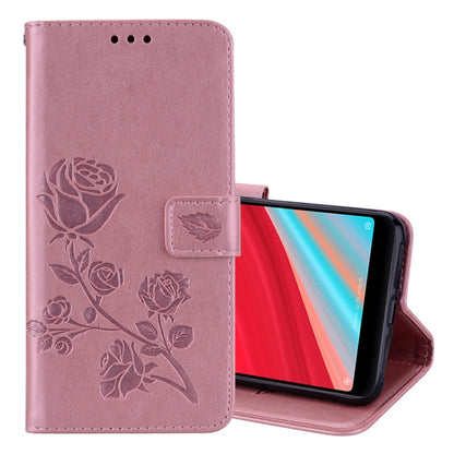 Pink PU leather flip phone case with rose embossing, holder and card-slot wallet