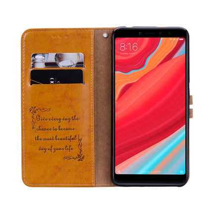 Brown leather flip wallet case with visible card slots and protective phone cover