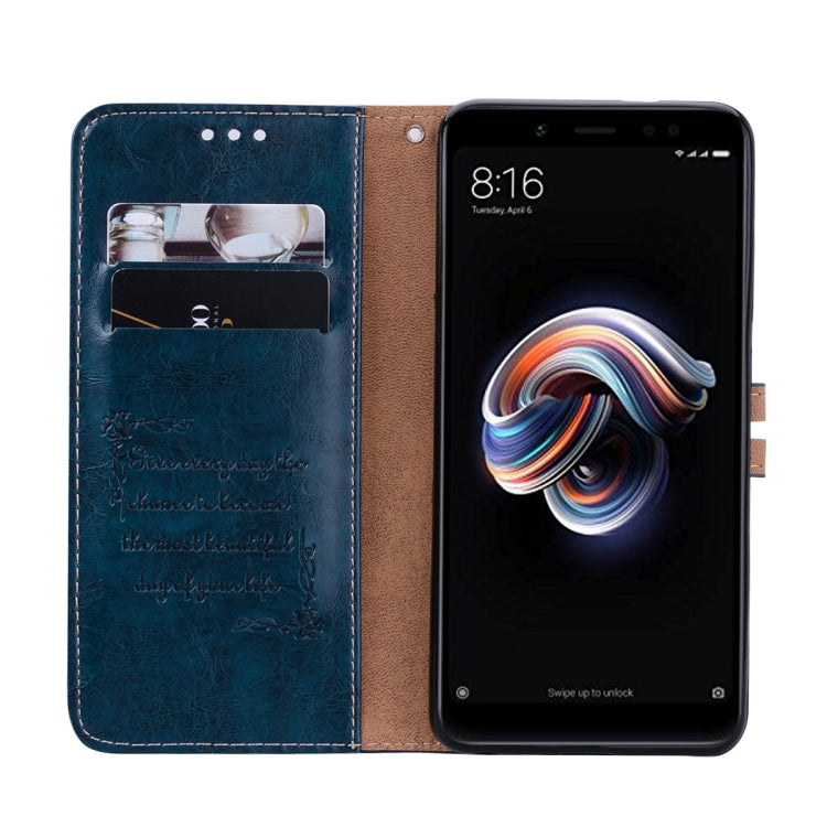 Blue flip leather wallet case with card slots and brown inner panel for phone