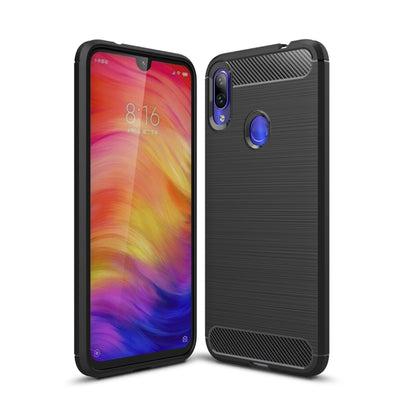 Black TPU phone case with brushed carbon fiber texture, camera cutouts, and textured grip