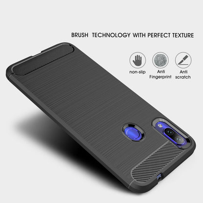 Black TPU phone case with brushed carbon fiber texture, raised lens area, and side button coverage