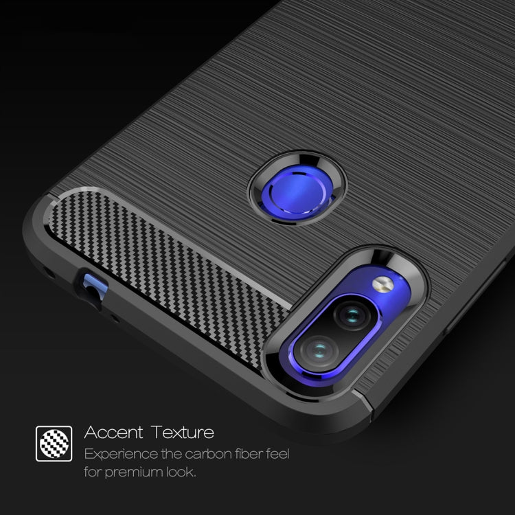 Black TPU phone case with textured carbon fiber pattern and blue-ring camera cutout