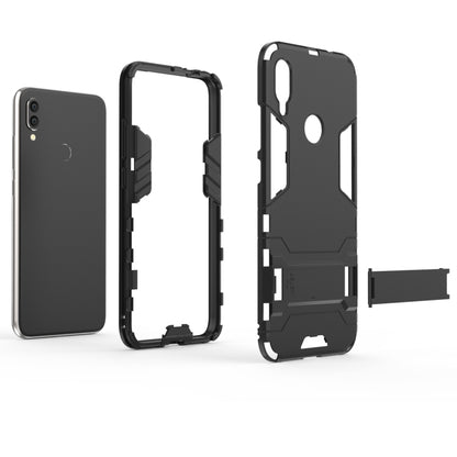 Black shockproof phone case with stand/strap piece, front and back open views