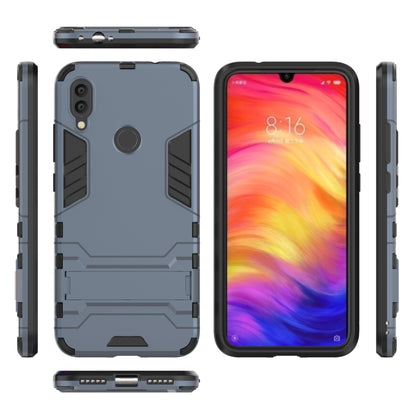 Navy blue shockproof phone case with side buttons cutouts, front, back, and profile views