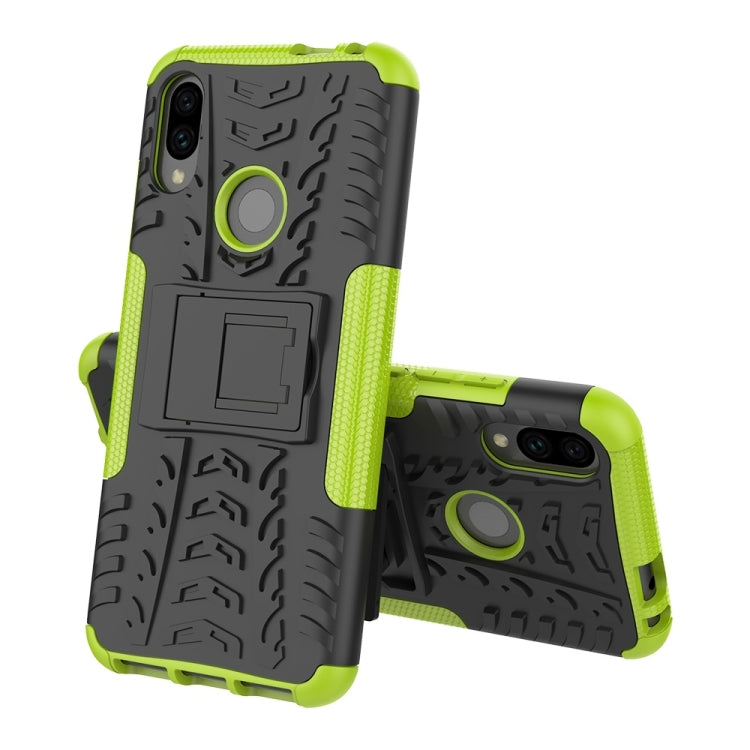 Green and black tire-texture shockproof phone case with built-in ring holder