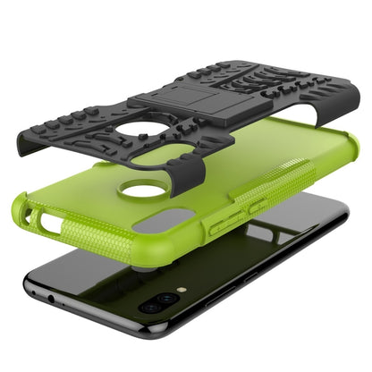 Green and black tire-texture shockproof phone case with fold-out holder for viewing
