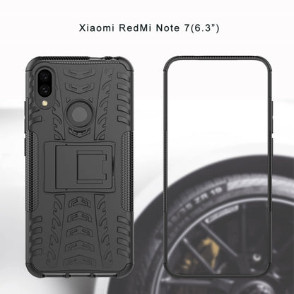 Black tire-texture shockproof phone case with holder cutout and camera opening