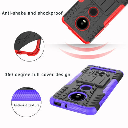 Multiple tire-texture shockproof phone cases in blue, purple, red, and black with holder
