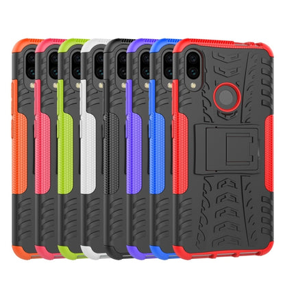 Tire-texture shockproof phone case collection in assorted colors with raised corners