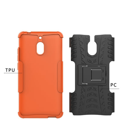 Orange phone case front and back views with tire texture and PC bumper