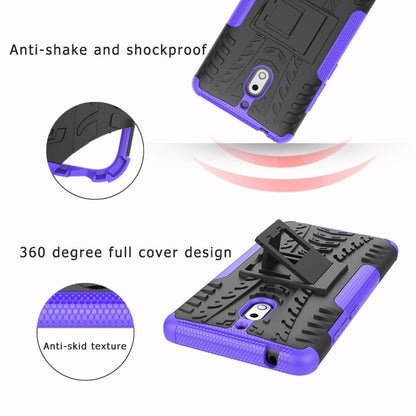 Blue and black tire-textured shockproof phone case with anti-slip side grips