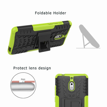 Green and black tire-textured phone case with foldable holder stand