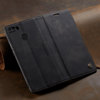 Dark leather flip wallet phone case with stitched edges and circular cutout