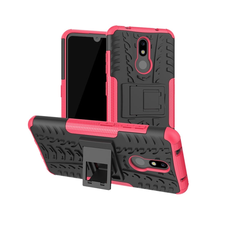 Shockproof tire-texture TPU+PC phone case with holder, pink and black