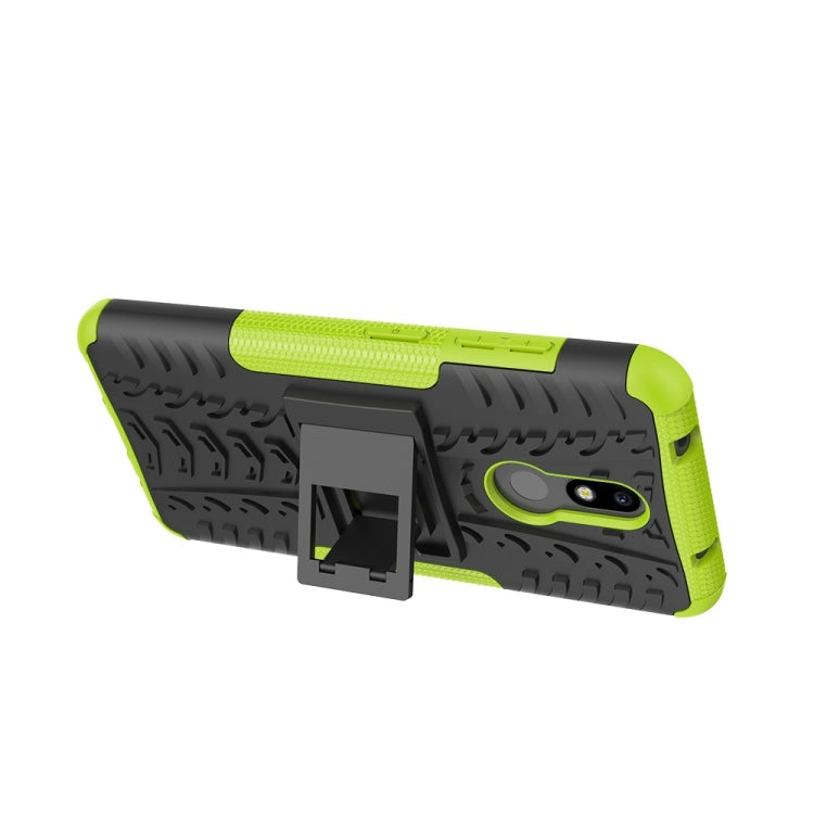 Nokia 3.2 tire texture case in neon green and dark gray, with hinged holder