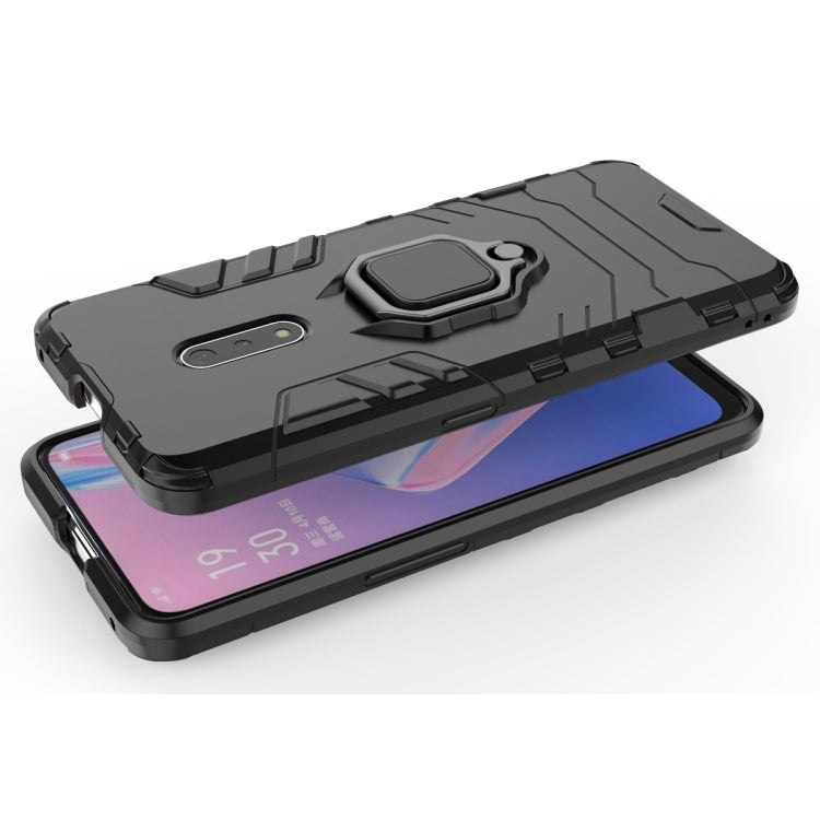 Black rugged phone case with magnetic ring holder; slim profile side view