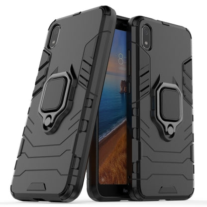 Pair of black rugged phone cases with magnetic ring holder