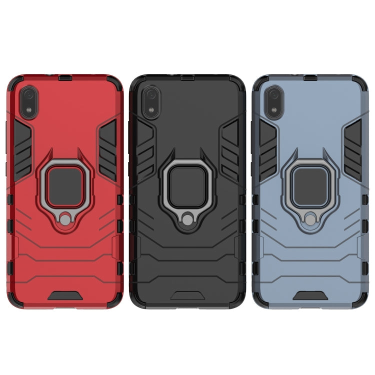 Three rugged phone cases in red, black, and blue with magnetic ring holder