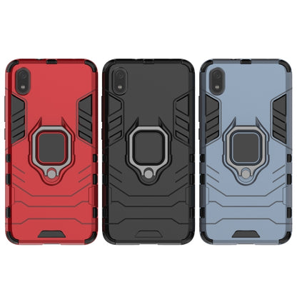 Three rugged phone cases in red, black, and blue with magnetic ring holder