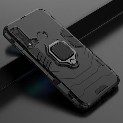 Black shockproof phone case detail with magnetic ring holder and camera openings
