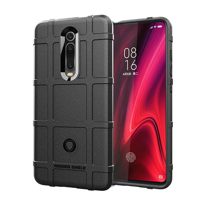 Rugged silicone phone case with full coverage, raised edges, and camera cutouts in black