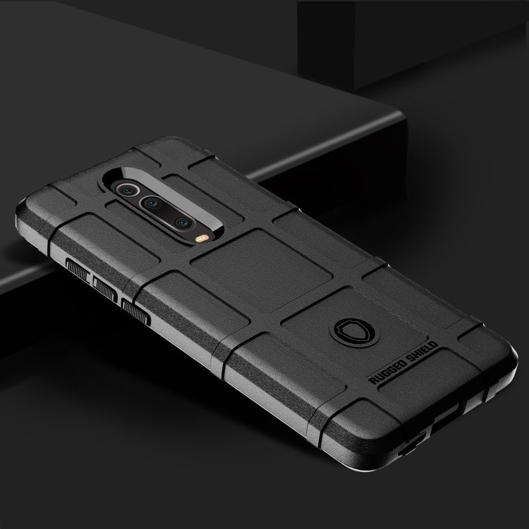 Black shockproof rugged silicone phone case with textured grip and camera protection