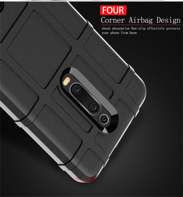 Black rugged silicone phone case with corner airbag design and triple camera cutout